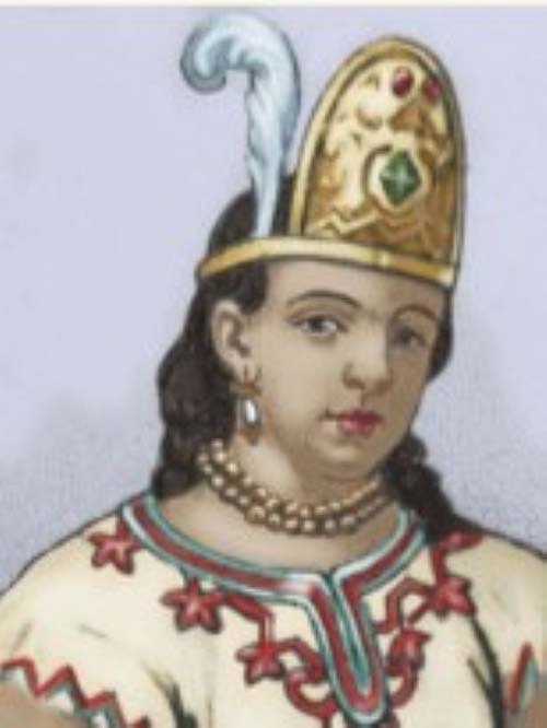 Persona con vestimenta tradicional adornada con estrellas rojas y un tocado dorado con plumas blancas.

Descripción generada con IA